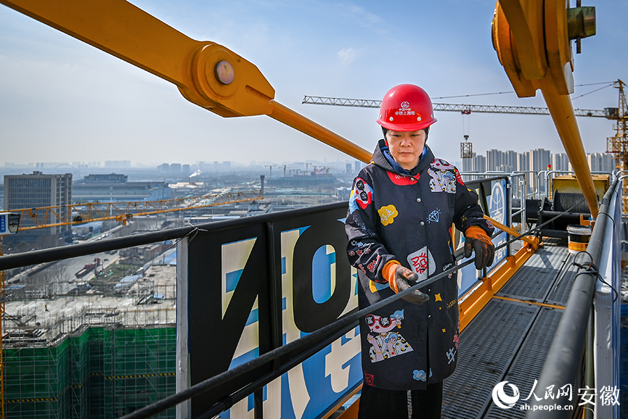 In pics: Female workers at a construction site in E China's Anhui