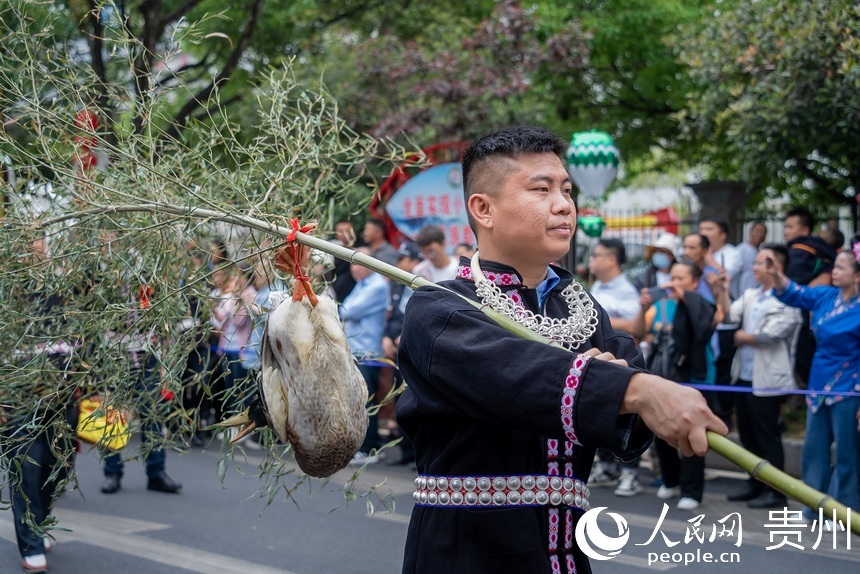 People celebrate Miao Sisters Festival in SW China's Guizhou