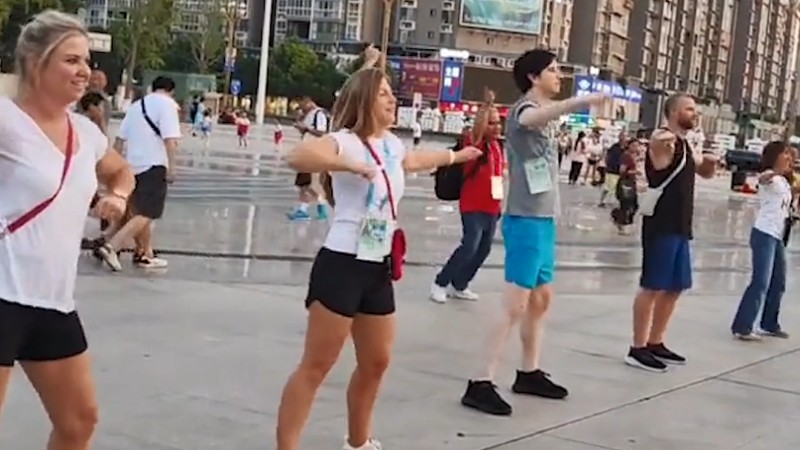 International newcomers try out dancing in the streets