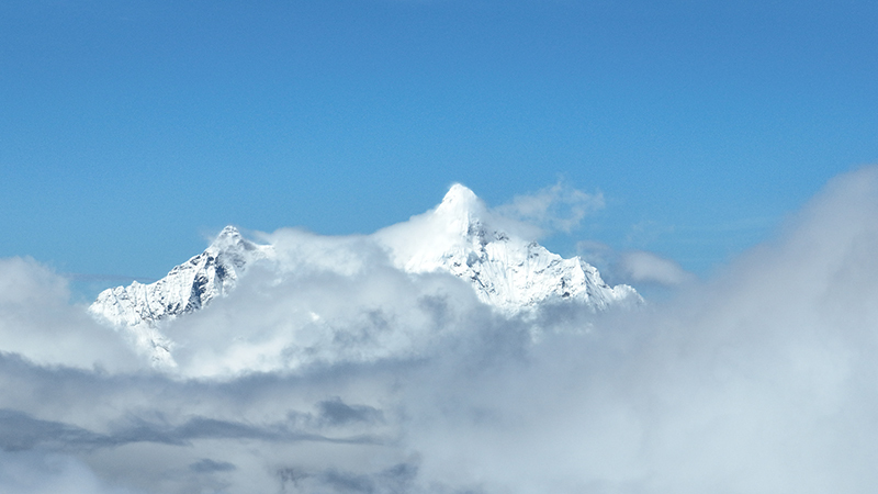 Spectacular views emerge after snowfall at Baima Snow Mountain