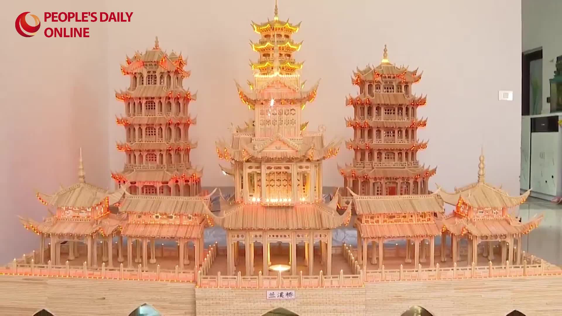 Craftsman from SW China's Yunnan turns used disposable chopsticks into wondrous miniatures of architecture