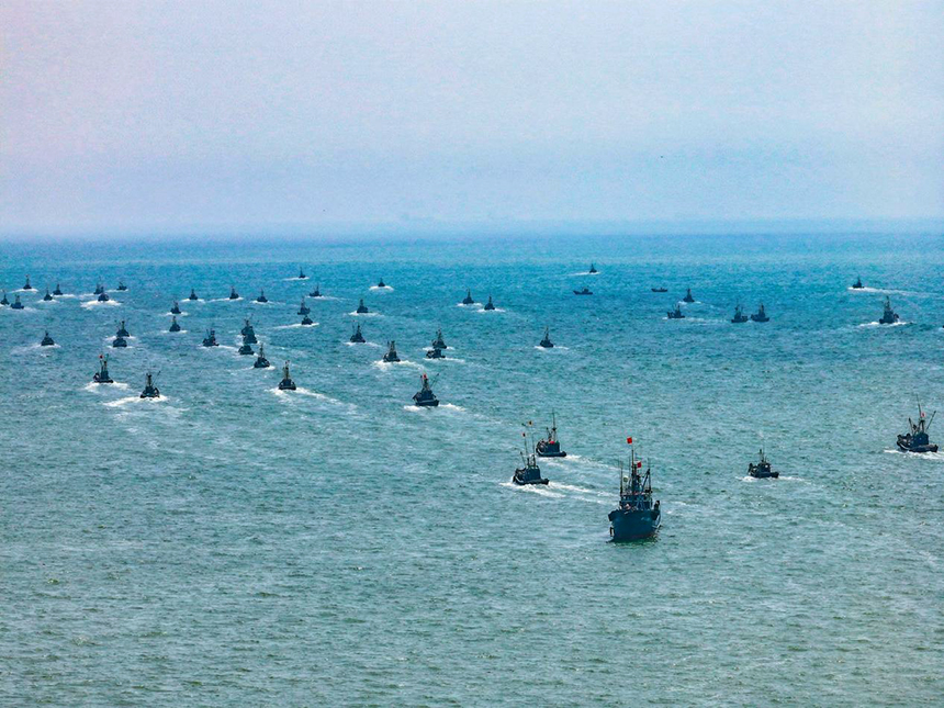 Hundreds of fishing boats set sail in E China as fishing ban lifted