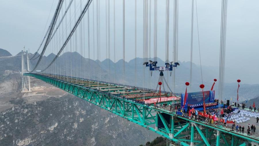 China completes main structure of world's tallest bridge