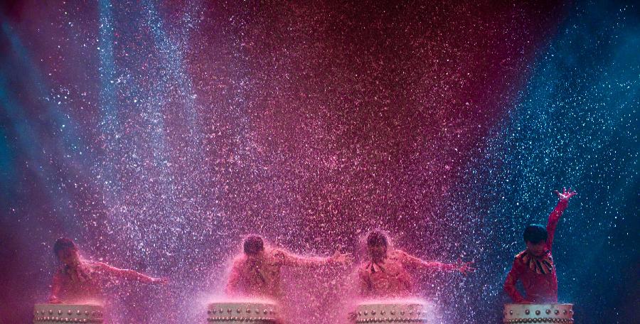 Dancers perform during a tourism dance "Tengchong Dream" in Tengchong County of southwest China's Yunnan Province, Nov. 4, 2012. The large-scale tourism dance is a national-standard grand cultural banquet which takes Tengchong's history and local customs as the main contents and can perfectly reflect the local features of Tengchong. (Xinhua/Zheng Huansong)