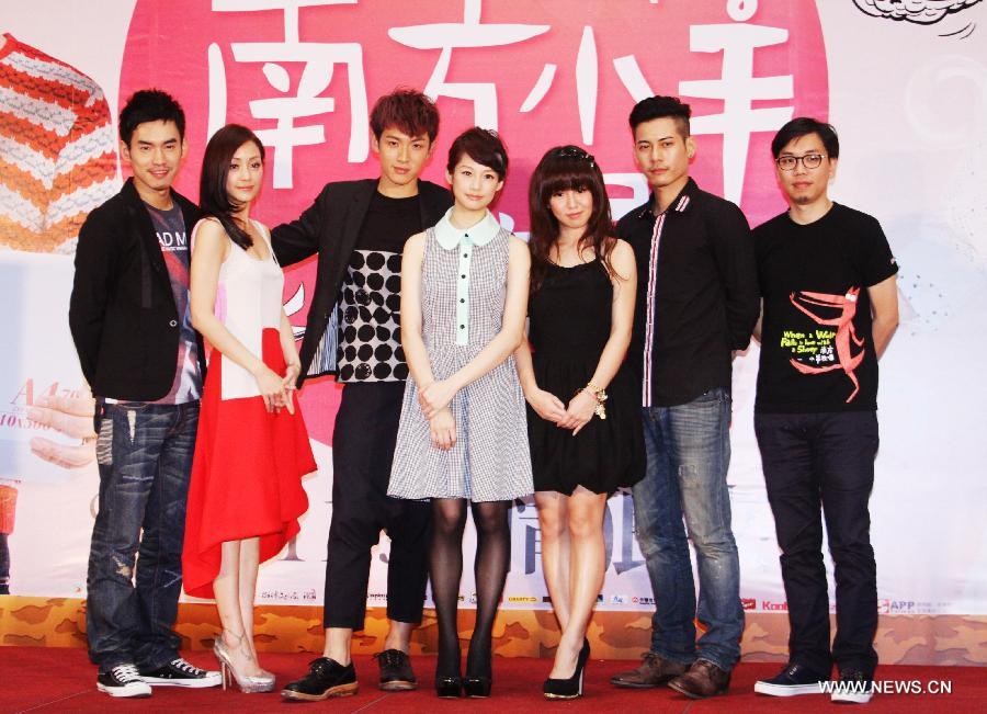 Actors Bryan Shu Hao Chang (1st L), Nikki Hsin-Ying Hsieh (2nd L), Ko Chen Tung (3rd L), Man-Shu Chien (4th R), Sawyer Kuak (3rd R), Ting Wei Lu (2nd R) and director Chi-Jan Hou (1st R) attend the press conference of Hou's new film "When a Wolf falls in love with a Sheep" in Taipei, of southeast China's Taiwan, Nov. 5, 2012. The film will be released on Nov. 9. (Xinhua)
