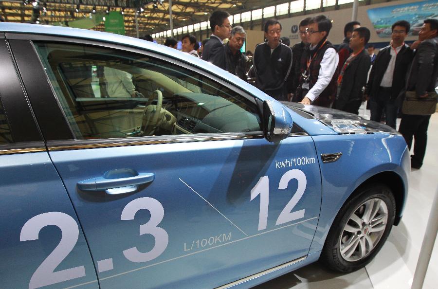 A Roewe 550 hybrid car is displayed at the 14th China International Industry Fair in east China's Shanghai Municipality, Nov. 6, 2012. The industry fair opened to the public Tuesday at Shanghai New International Expo Center, with 1,648 exhibitors from at home and abroad. (Xinhua/Pei Xin) 