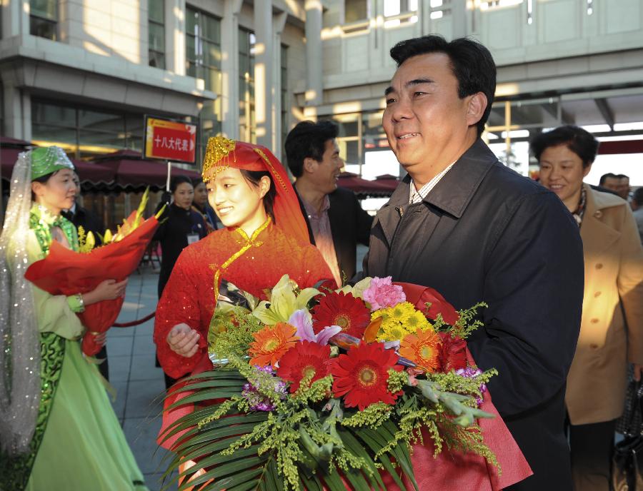 Delegates of the 18th National Congress of the Communist Party of China (CPC) from Ningxia Hui Autonomous Region arrive in Beijing, capital of China, Nov. 5, 2012. The 18th CPC National Congress will be opened in Beijing on Nov. 8. (Xinhua/Xie Huanchi)