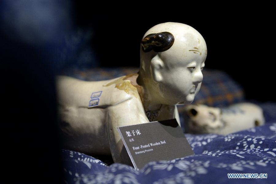 Photo taken on Nov. 7, 2012 shows a ceramic pillow displayed at the folk arts museum of Shandong University of Art & Design in Jinan, capital of east China's Shandong Province. (Xinhua/Guo Xulei)