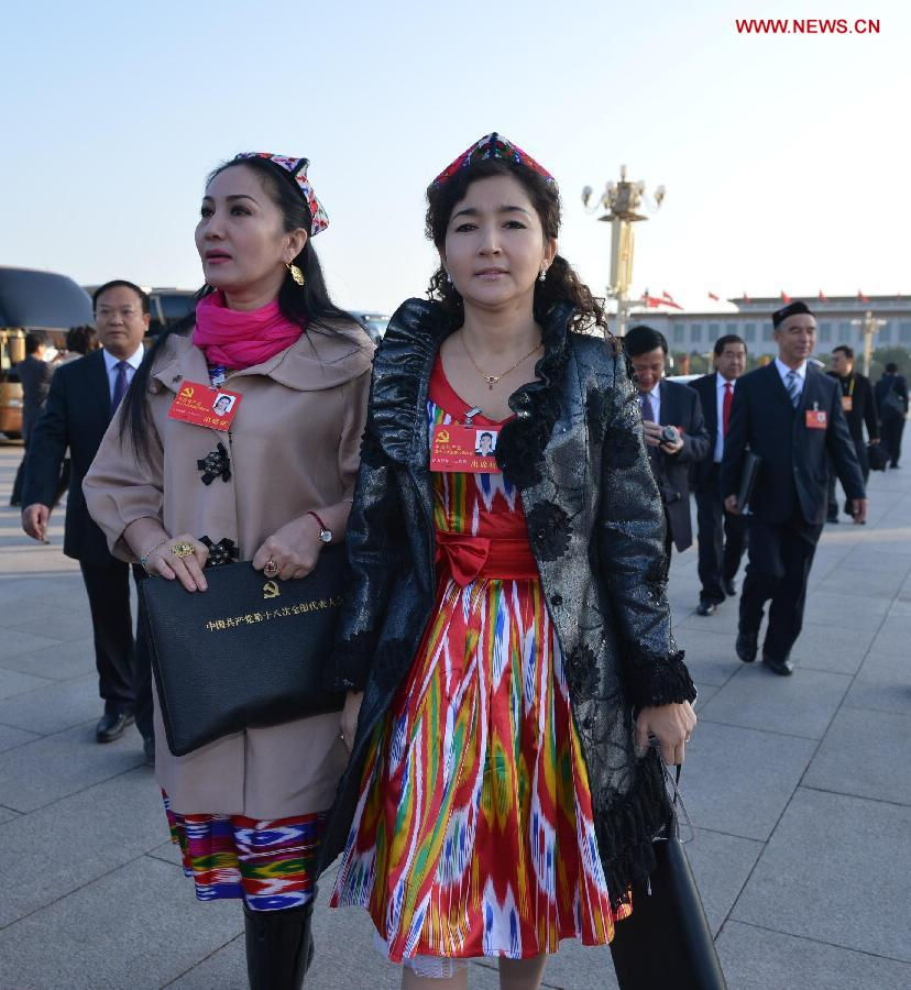 Delegates of the 18th National Congress of the Communist Party of China (CPC) arrive to attend the 18th CPC National Congress at the Great Hall of the People in Beijing, capital of China, Nov. 8, 2012. The 18th CPC National Congress will be opened in Beijing on Thursday morning. (Xinhua/Li Xin) 