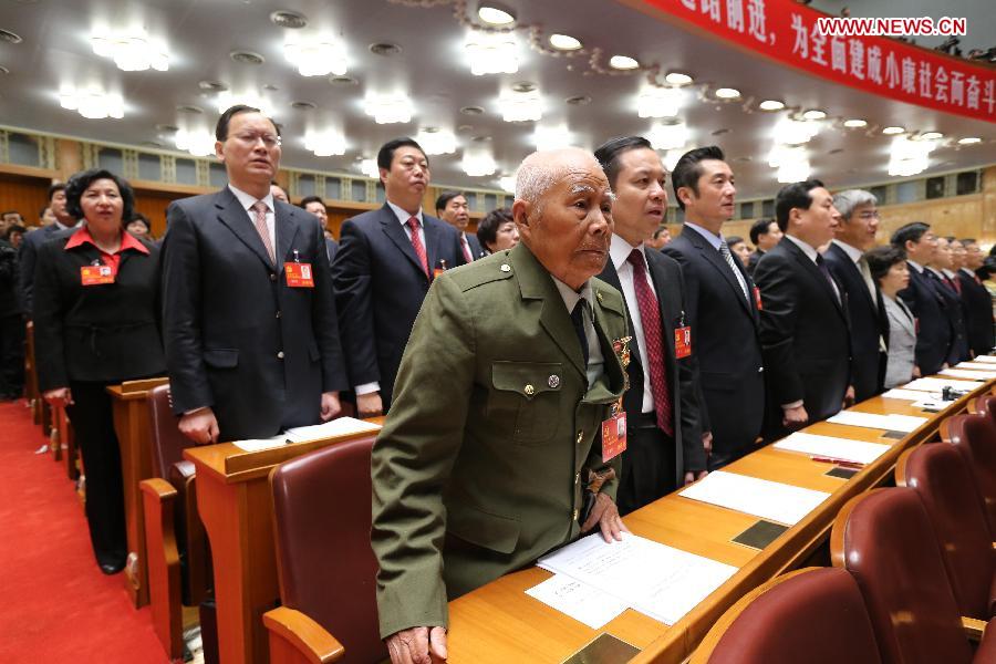 Delegates sing national anthem during the opening ceremony of the 18th National Congress of the Communist Party of China (CPC) at the Great Hall of the People in Beijing, capital of China, Nov. 8, 2012. The 18th CPC National Congress opened in Beijing on Thursday. (Xinhua/Yao Dawei)