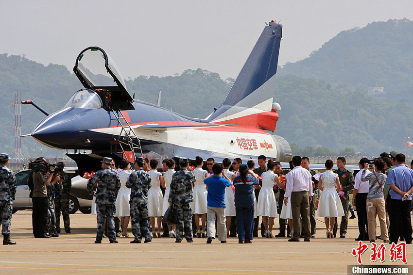 Eight J-10 jet fighters of PLA Air Force’ August 1st Aerobatic Team arrive at Zhuhai in Guangdong province on Nov. 5, 2012. One of the jets will be exhibited on the ground and the other seven will give aerobatic performances during the 9th China International Aviation & Aerospace Exhibition to be held in Zhuhai from Nov.13 to 18. (Chinanews.com/ Lu Haifeng)