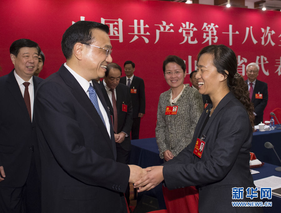 Li Keqiang (L, front) joins a panel discussion of Shandong delegation to the 18th National Congress of the Communist Party of China (CPC) in Beijing, capital of China, Nov. 8, 2012. The 18th CPC National Congress was opened in Beijing on Thursday. (Xinhua/Li Xueren)