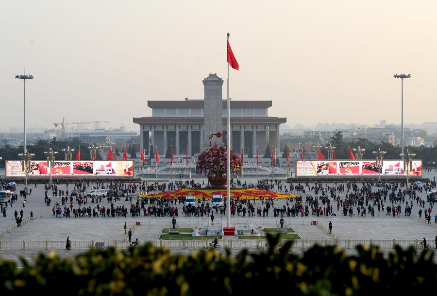 A pair of large screens display achievements which China has gained under the leadership of the Communist Party of China (CPC) in the past decade, at the Tian'anmen Square in central Beijing, capital of China, Nov. 8, 2012. The 18th CPC National Congress was opened in Beijing on Thursday. (Xinhua/Luo Xiaoguang)