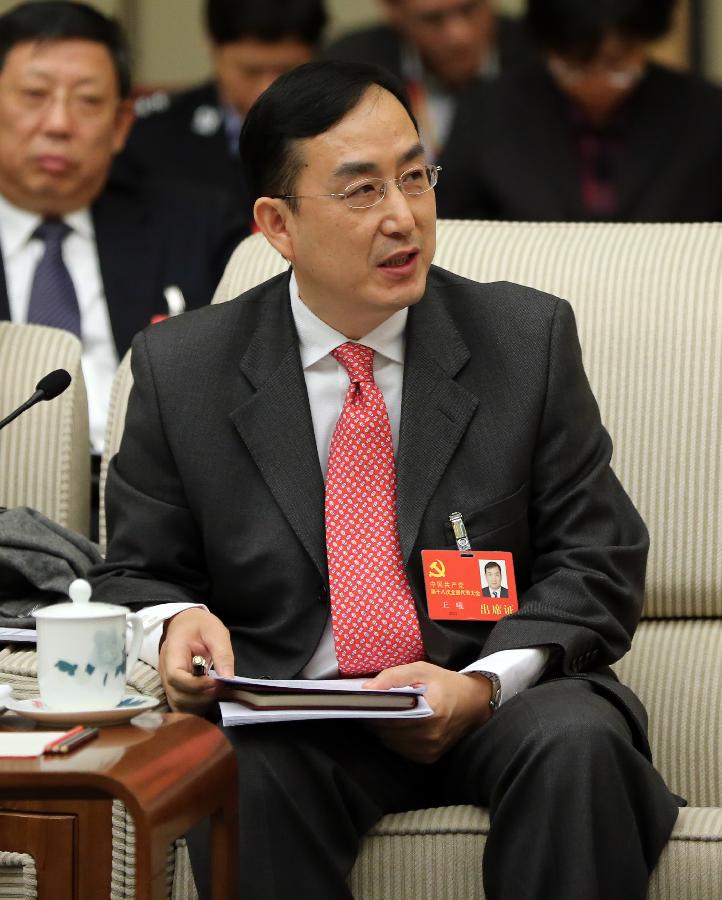 Wang Xi, a member of the Shanghai delegation of the 18th National Congress of the Communist Party of China (CPC), speaks at the delegation's panel discussion in Beijing, capital of China, Nov. 10, 2012. (Xinhua/Lan Hongguang)