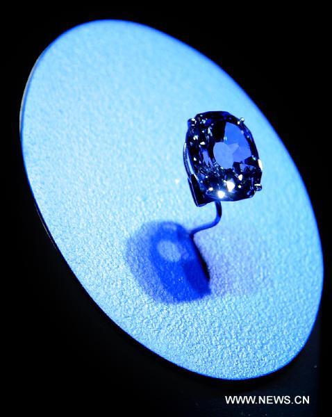 The 31.06 carat Wittelsbach-Graff blue diamond is on display at the American Museum of Natural History in New York, the United States, Oct. 28, 2010. The diamond was bought by Laurence Graff at a Christie's auction in December 2008 in London for a record USD 24.3 million. (Xinhua/Shen Hong)