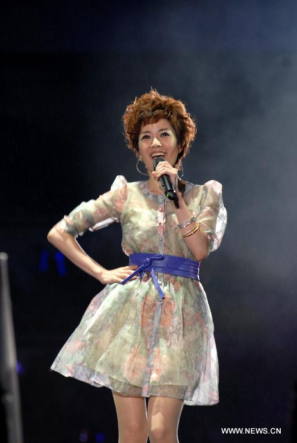 Singer Yuki Hsu sings at Rock Records 30th Anniversary Nanjing Concert in Nanjing, capital of east China's Jiangsu Province, Nov. 10, 2012. More than 50 singers performed at the concert. (Xinhua/Wang Yuewu)  