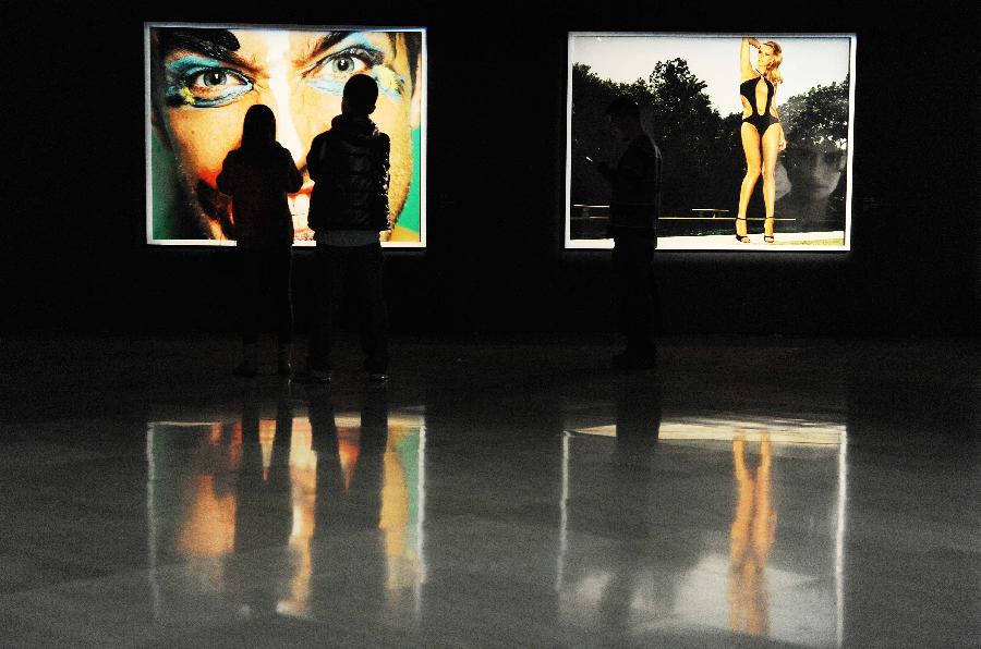 People visit the former site of Shanghai Art Museum in east China's Shanghai Municipality, Nov. 11, 2012. (Xinhua/Lai Xinlin) 