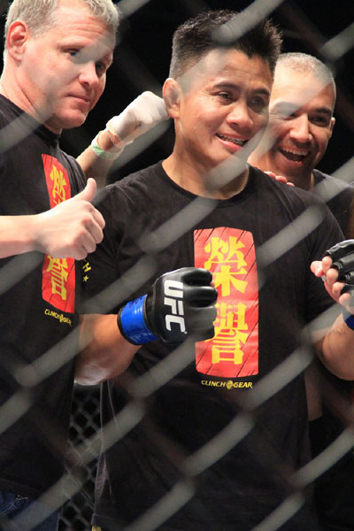 Cung Le has his hand raised following his knockout victory over Rich Franklin at UFC Macao, November 10, 2012.[Photo: CRIENGLISH.com/Xu Weiyi] 