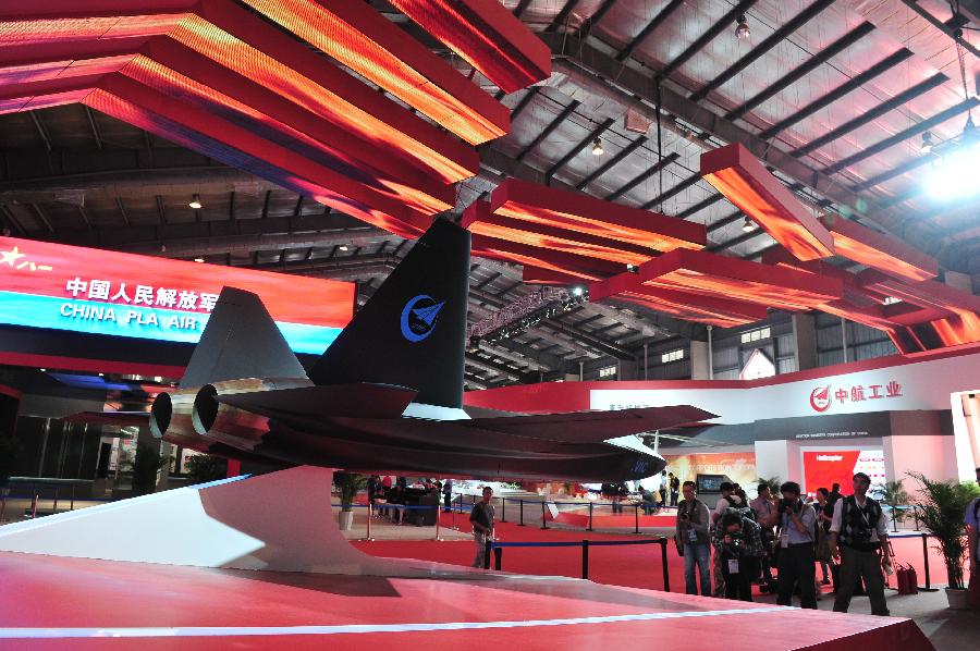 Photo taken on Nov. 12, 2012 shows a conceptual fighter model made by the Aviation Industry Corporation of China (AVIC), in Zhuhai, south China's Guangdong Province. The 9th China International Aviation and Aerospace Exhibition kicked off on Tuesday in Zhuhai. As a major exhibitor, AVIC will showcase over 150 products during the 6-day-long airshow. (Xinhua/Yang Guang)