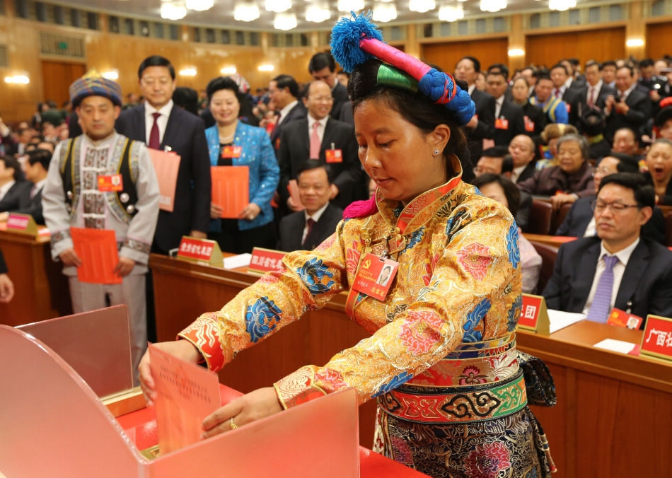 A delegate casts his ballot during the closing session of the 18th National Congress of the Communist Party of China (CPC) at the Great Hall of the People in Beijing, capital of China, Nov. 14, 2012. The congress started its closing session here Wednesday morning, at which a new CPC Central Committee and a new Central Commission for Discipline Inspection will be elected. (Xinhua/Yao Dawei)