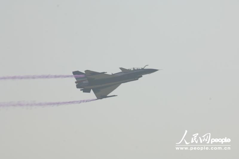 Several J-10 fighters from PLA Air Force perform at the opening ceremony of Airshow China 2012 on November 13 in Zhuhai in south China’s Guangdong province. Visitors highly praised the excellent piloting skill as well as the exceptional function of the jet fighters. (People’s Daily Online/ Yan Jiaqi)