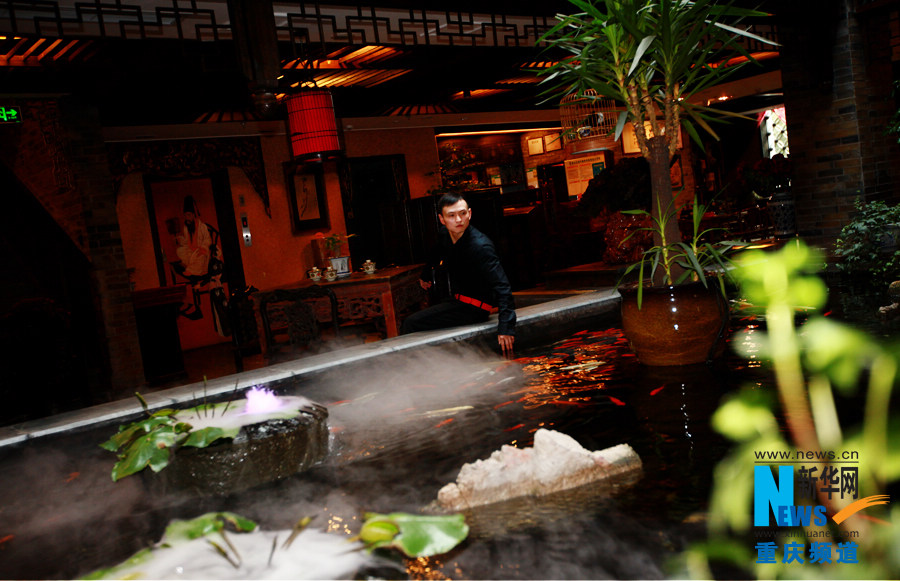 Liu enjoys the peace and comfort in the Shouzuo Mansion in Chongqing on Oct. 18, 2012.