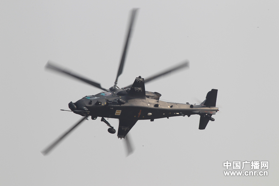 A WZ-10 attack helicopter practices on the first day of Airshow China 2012, which kicked off in south China’s Zhuhai on Nov. 13, 2012, after its first public appearance on Nov. 11, 2012. WZ-10, nicknamed China’s “Apache”, is the most advanced attack helicopter of the PLA and also the most expected Chinese aircraft at the Airshow China 2012. (CNR/Xu Ao)