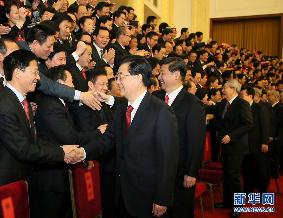 Chinese President Hu Jintao and newly-elected General Secretary of the Communist Party of China (CPC) Central Committee and Chairman of the CPC Central Military Commission Xi Jinping meet with delegates, special delegates and observers to the recently concluded 18th CPC National Congress, in Beijing, capital of China, Nov. 15, 2012. (Xinhua/Ju Peng)