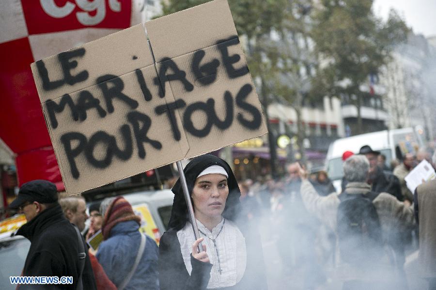 People attend a demonstration called by French trade unions, in Paris, France, Nov. 14, 2012. As part of the massive anti-austerity demonstration across Europe, thousands of French people took the streets on Wednesday to express their frustation over the austerity. (Xinhua/Etienne Laurent)