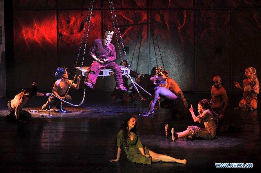 Actors perform during the musical Notre-Dame de Paris at Qingdao Grand Theatre in Qingdao, east China's Shandong Province, Nov. 18, 2012. (Xinhua/Li Ziheng) 