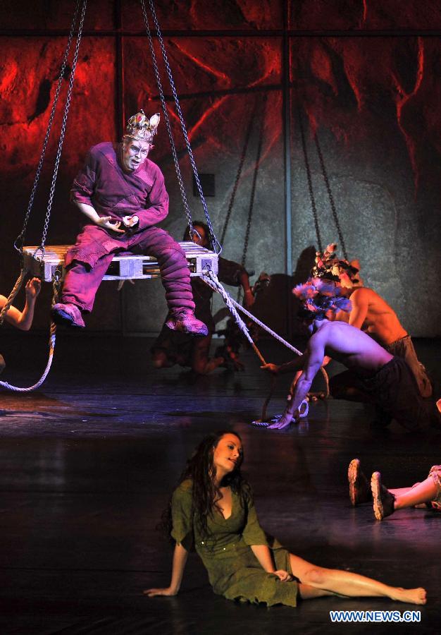 Actors perform during the musical Notre-Dame de Paris at Qingdao Grand Theatre in Qingdao, east China's Shandong Province, Nov. 18, 2012. (Xinhua/Li Ziheng) 