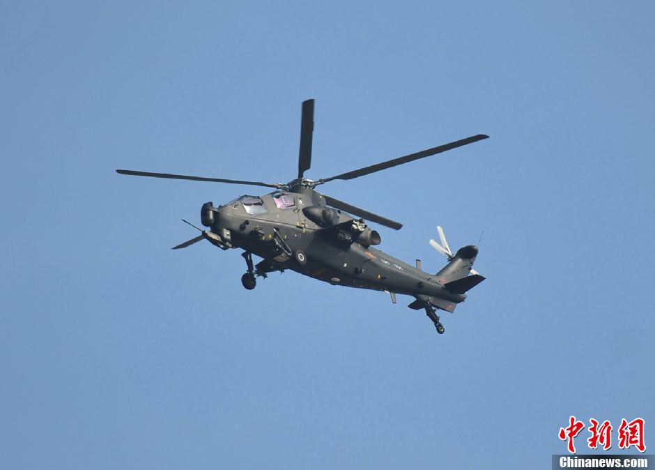 A WZ-10 attack helicopter practices on the first day of Airshow China 2012, which kicked off in south China’s Zhuhai on Nov. 13, 2012, after its first public appearance on Nov. 11, 2012. WZ-10, nicknamed China’s “Apache”, is the most advanced attack helicopter of the PLA and also the most expected Chinese aircraft at the Airshow China 2012. (CNR/Xu Ao)