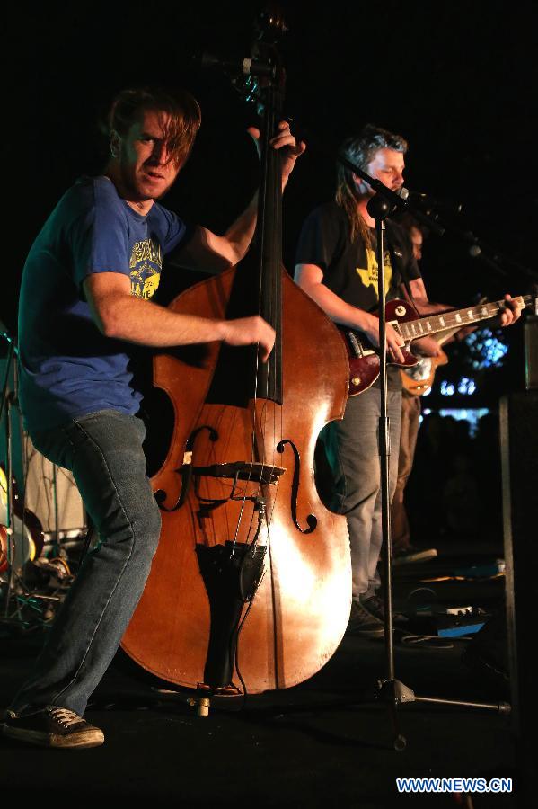 A rock and roll band from Canada performs during Pu'er International Country Music Festival in Pu'er, southwest China's Yunnan Province. (Xinhua/Li Mingfang)