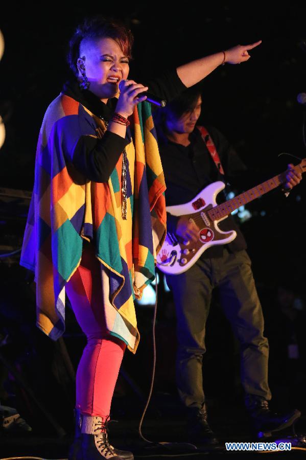 Lead singer of the band Dream sings during Pu'er International Country Music Festival in Pu'er, southwest China's Yunnan Province. (Xinhua/Li Mingfang)