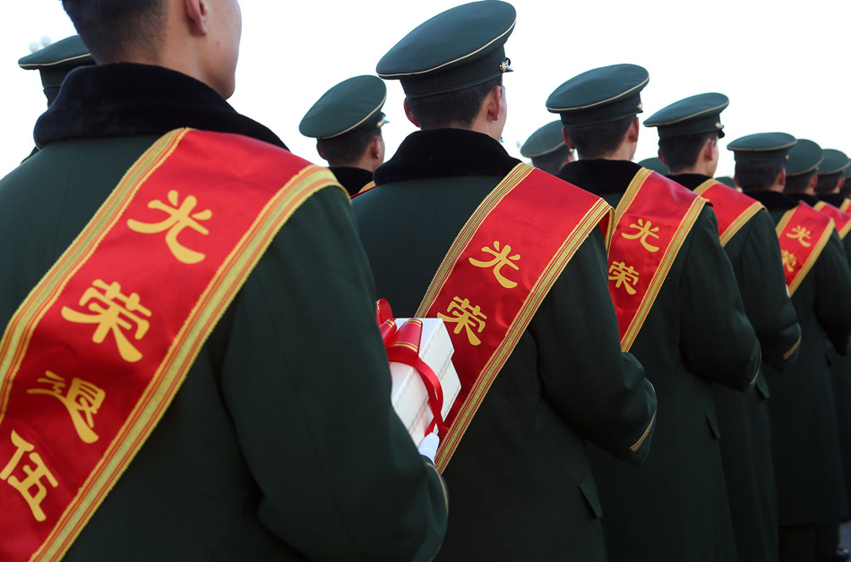 More than 400 Chinese armed policemen from Tian’anmen guard team attend the national flag rising ceremony on the Tian’anmen Square in Beijing on Nov. 23. It is the last time for them to attend national flag rising ceremony as soldiers as they will soon be discharged from active military service. (Xinhua/ Wan Xiang)