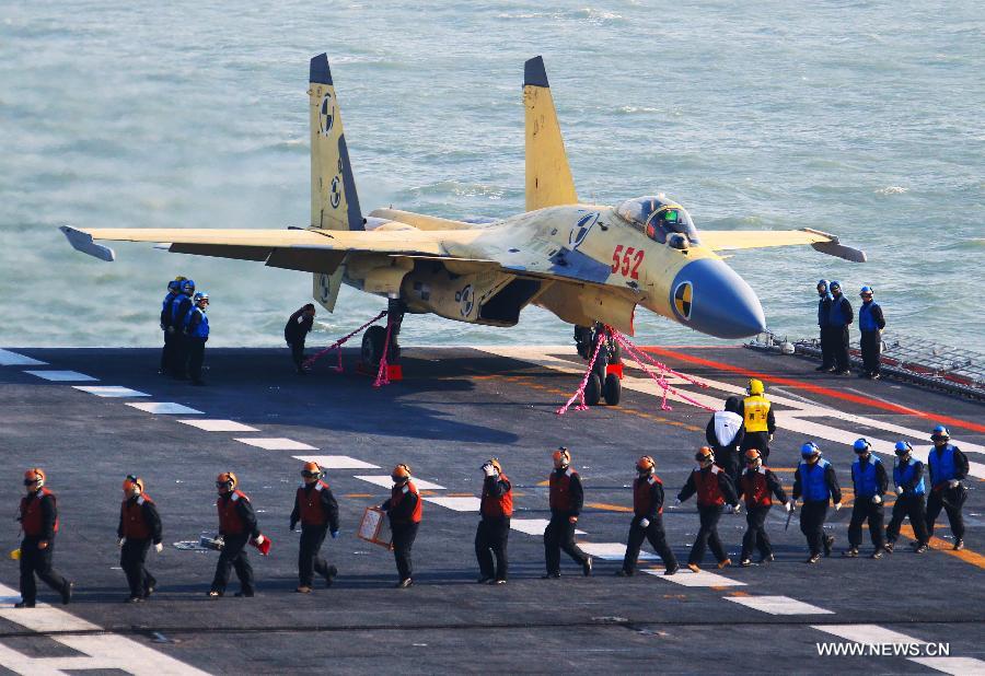 This undated photo shows a carrier-borne J-15 fighter jet on China's first aircraft carrier, the Liaoning. (Xinhua/Zha Chunming) 