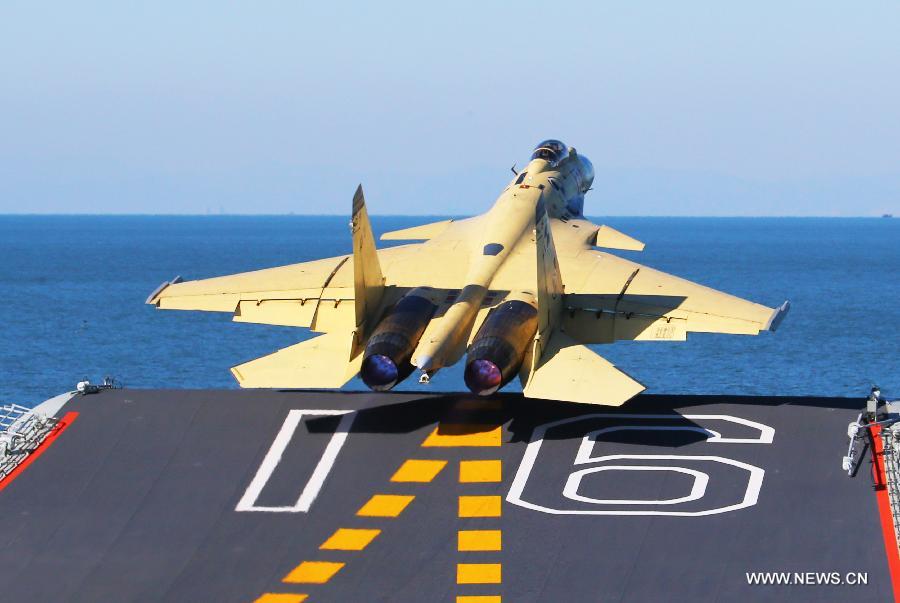 This undated photo shows a carrier-borne J-15 fighter jet taking off from China's first aircraft carrier, the Liaoning. (Xinhua/Zha Chunming) 