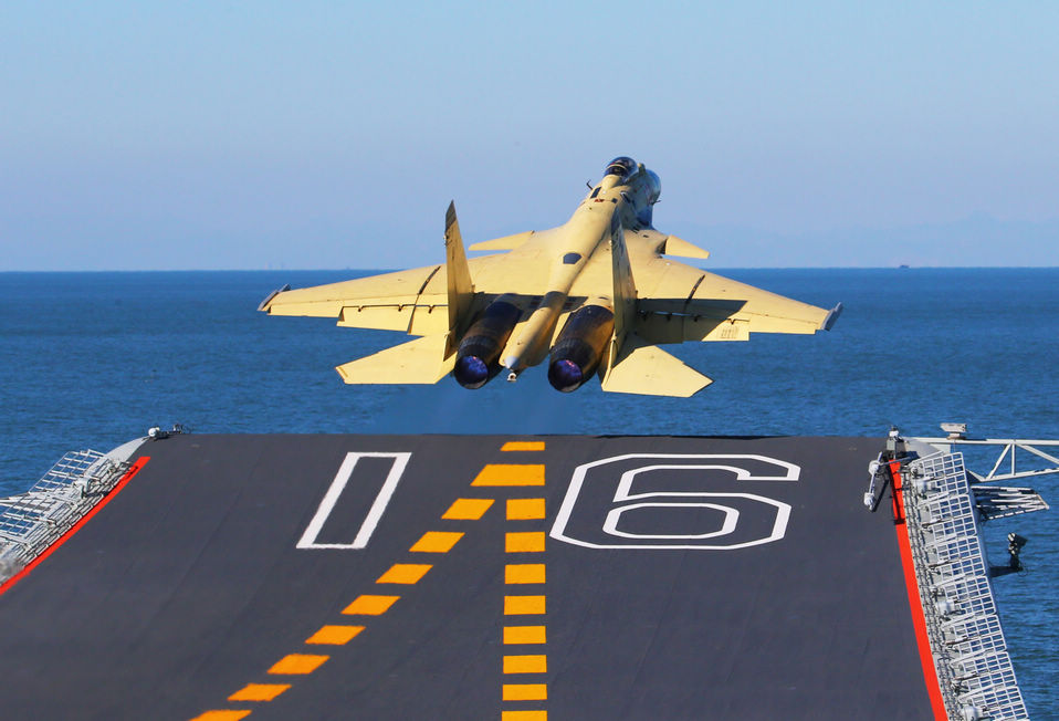 A J-15 fighter jet takes off from China's first aircraft carrier, the Liaoning.(Xinhua/Cha Chunming)