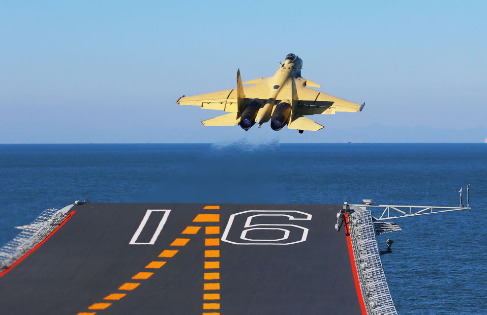 A J-15 fighter jet takes off from China's first aircraft carrier, the Liaoning.(Xinhua/Cha Chunming)