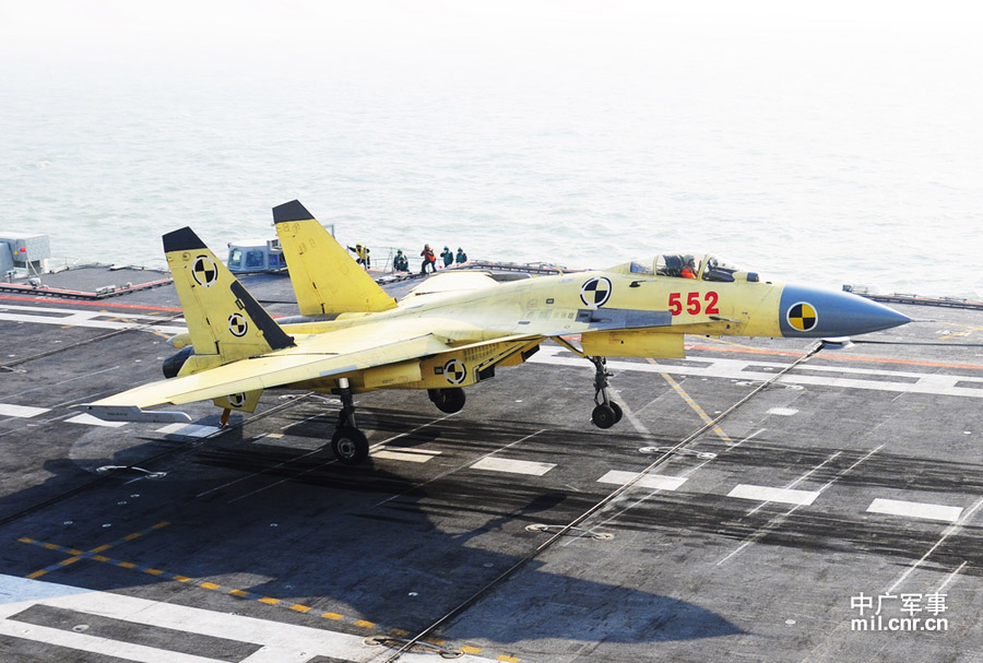 Photo shows carrier-borne J-15 fighter jet lands on China's first aircraft carrier, the Liaoning. (mil. cnr.cn/ Sun Li)