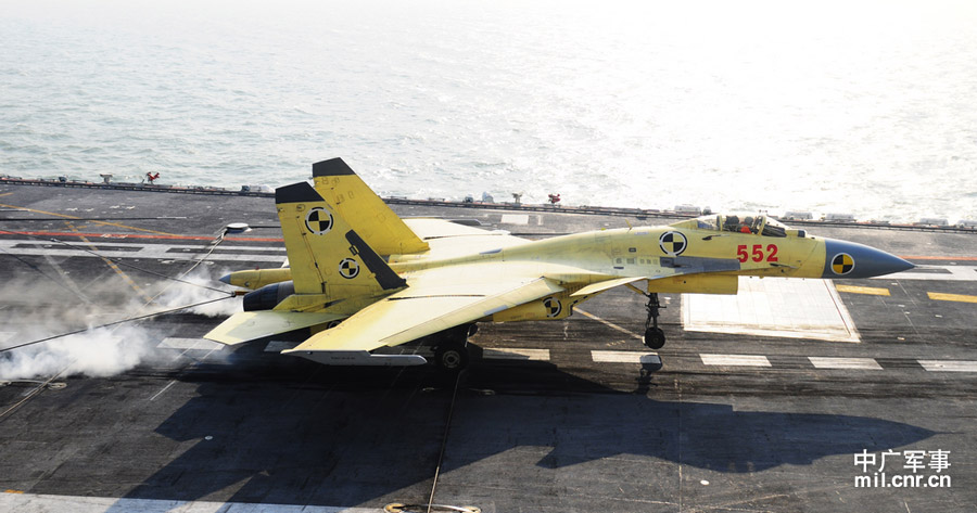 Photo shows carrier-borne J-15 fighter jet lands on China's first aircraft carrier, the Liaoning. (mil. cnr.cn/ Sun Li)