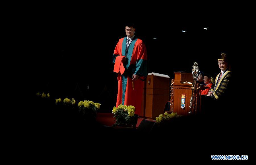 Former NBA star Yao Ming (L) and Hong Kong Chief Executive Leung Chun-ying are seen during the 187th Congregation of the University of Hong Kong, China, on Nov. 27, 2012. Yao Ming receives a Doctor Degree of Social Sciences honoris causa at the University of Hong Kong on Tuesday. (Xinhua/Chen Xiaowei) 