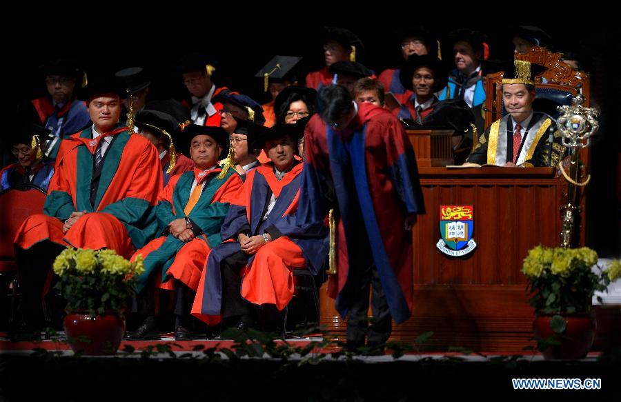 Former NBA star Yao Ming (1st L, Front) is seen during the 187th Congregation of the University of Hong Kong, China, on Nov. 27, 2012. Yao Ming receives a Doctor Degree of Social Sciences honoris causa at the University of Hong Kong on Tuesday. (Xinhua/Chen Xiaowei) 