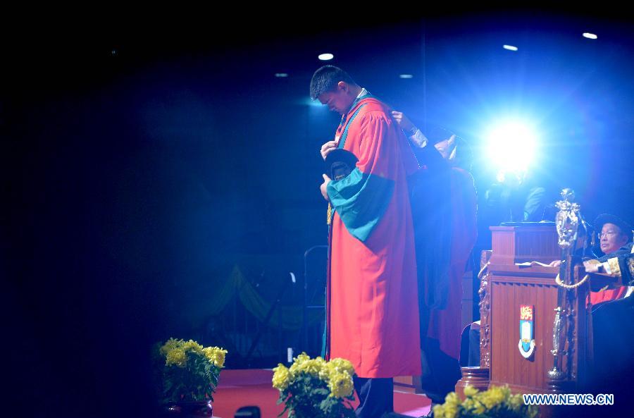 Former NBA star Yao Ming is seen during the 187th Congregation of the University of Hong Kong, China, on Nov. 27, 2012. Yao Ming receives a Doctor Degree of Social Sciences honoris causa at the University of Hong Kong on Tuesday. (Xinhua/Chen Xiaowei) 