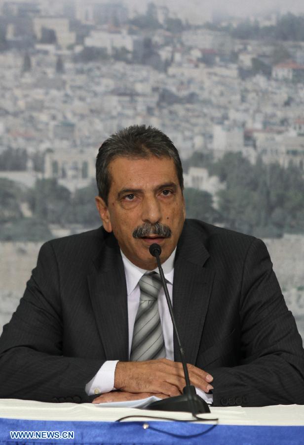 Tawfiq Tirawi, chief of the Palestinian committee to probe the circumstances of Arafat's death, speaks during a press conference in the West Bank City of Ramallah on Nov. 27, 2012. Earlier Tuesday, the Palestinian National Authority (PNA) finalized digging up the remains of Arafat, as Russian, Swiss and French experts took samples of the remains to inspect the reason behind his death. (Xinhua/Ayman Nobani)