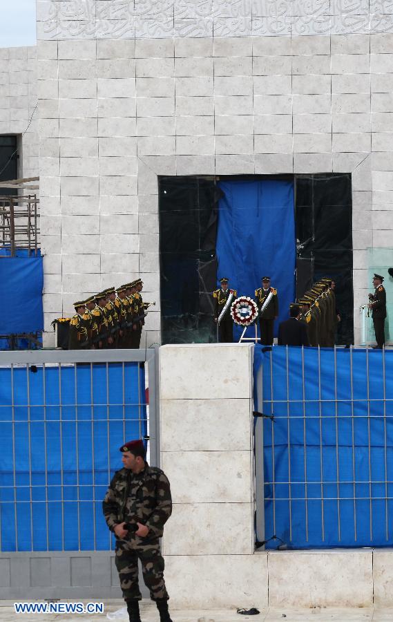 A Palestinian policeman patrols outside the mausoleum housing late Palestinian President Yasser Arafat, in the West Bank city of Ramallah, on Nov. 27, 2012. Earlier Tuesday, the PNA finalized digging up the remains of Arafat, as Russian, Swiss and French experts took samples of the remains to inspect the reason behind his death. (Xinhua/Ayman Nobani)