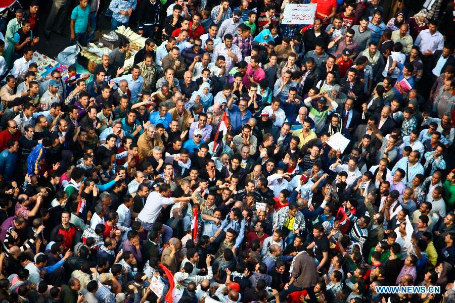Anti-Mursi protesters gather at Tahrir Square in Cairo, to participate a one-million-person rally rejecting the new constitutional declaration issued by President Mohamed Morsi on Nov. 27, 2012. (Xinhua/Amru Salahuddien) 