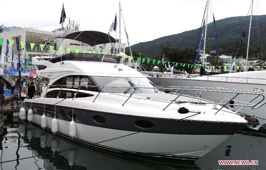 A yacht is pictured at its booth during Hong Kong International Boat Show 2012 in south China's Hong Kong, Dec. 2, 2012. The boat show closed on Sunday. (Xinhua/Li Peng) 