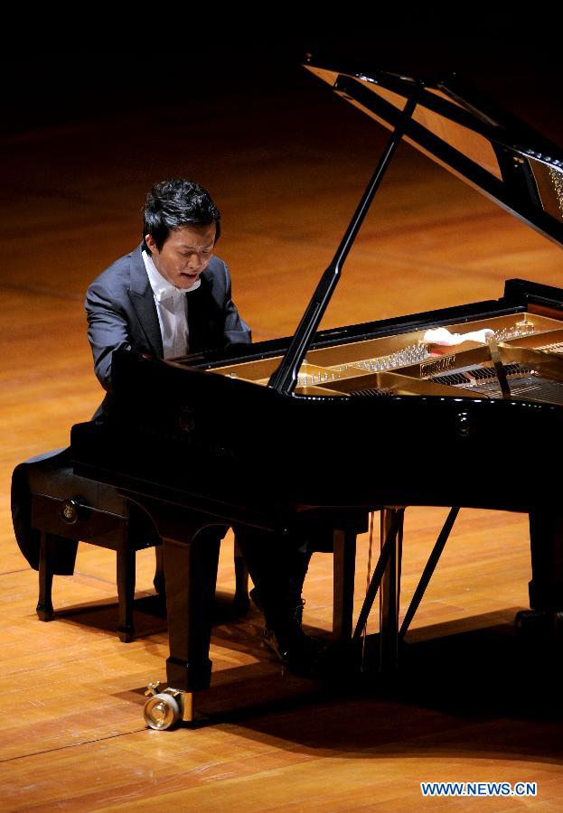 Chinese pianist Li Yundi gives performance at the National Centre for the Performing Arts (NCPA) in Beijing, capital of China, Dec. 1, 2012. (Xinhua/Luo Xiaoguang)