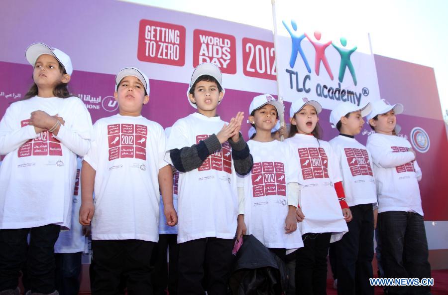 Libyan children attend the ceremony to mark the World AIDS Day in Tripoli, capital of Libya, Dec. 1, 2012. The World AIDS Day which is annually observed on Dec. 1 is dedicated to raising awareness of the AIDS pandemic caused by the spread of HIV infection. (Xinhua/Hamza Turkia)
